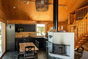 Фото номера Коттедж с 1 спальней и сауной Шале Kalaranta Cottage г. Муураме 8
